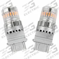 GROTE Compact LED Bulb: LED, Plastic Wedge Double Filament (W2.5x16q), (S) Sign, S8, 3157 NA, Amber (MPN 94853-4). Key specifications — Brand: GROTE; Voltage: 9 to 16V AC/DC; Bulb Shape: S8; Light Color: Amber; Trade Number: 3157 NA.