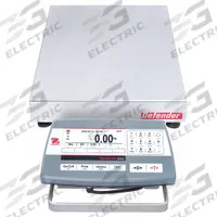 OHAUS Industrial Bench Scale: 12 in x 14 in, Not IP Rated, Front-Mounted, Defender 5000 (MPN 30461653). Key specifications — Connection Ports: RS-232; Readability: 0.005 lb/2 g; Brand: OHAUS; Weighing Surface Material: Stainless Steel.