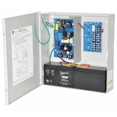 This power supply board with enclosure operates on 115V AC input and delivers selectable 12VDC at 3.5A or 24VDC at 3A output. Housed in a steel enclosure, it is used to power access control systems, security panels, and other low-voltage devices.