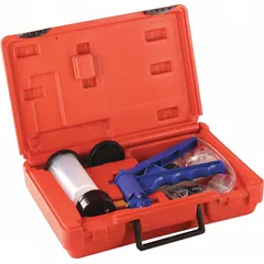This hand-operated vacuum pump kit is used for manual vacuum generation in industrial maintenance and service tasks. It includes a metal calibrator and is suited for portable operation, such as evacuating fluids or testing vacuum systems in plant and field environments.
