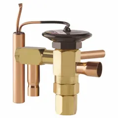 Thermostatic expansion valve for R-404A refrigerant with a nominal capacity of 2 tons. Features a removable strainer and field-adjustable superheat adjustment. Used in commercial refrigeration systems to regulate refrigerant flow into the evaporator.