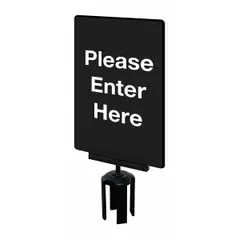 Black acrylic sign for Tensabarrier posts, displaying the message 'Please Enter Here'. Includes mounting adapter for attachment to compatible posts. Measures 11 inches overall length by 7 inches overall width. Used to direct pedestrian flow in public venues.
