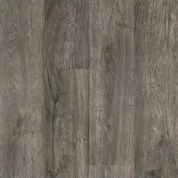 This luxury vinyl tile features an embossed, square Glen Brook Oak design in Evening Shadow color. The 6-inch tile width is suited for commercial and residential flooring applications, providing a realistic wood-look surface