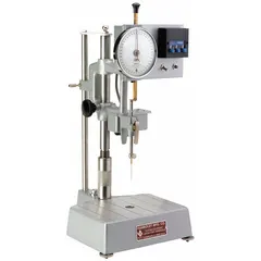 Analog penetrometer with 5 1/2 in plunger length and 3/8 in plunger width. Includes 50 g loading weights. Used for measuring consistency and firmness in agricultural soil testing and food product quality control.