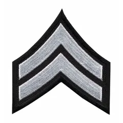 Embroidered rank insignia patch for identifying the rank of Corporal on military or law enforcement uniforms. Measures 3 inches with white embroidery on a black background. Constructed from a blend of polyester and rayon. Sold as a single patch.