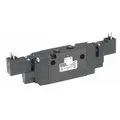 Four-way, two-position, double solenoid inline valve with 24V DC solenoid. Internal pilot actuation with non-locking solenoid return. Includes DIN solenoid connector and solenoid coil. Used for pneumatic directional control in industrial automation systems.