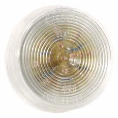 LED clearance light with a round, clear lens and bracket mount. Overall diameter 2-1/2 in. Features a female pin connector and SAE P2 lens code. Used on trucks, trailers, and heavy equipment for side and rear identification lighting.