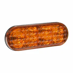 Oval-shaped LED warning light with amber/blue illumination, designed for perimeter mounting on vehicles. Operates on 12 to 24V DC and offers 12 selectable flash patterns. Features a grommet mount and blunt cut wire connection. Typical applications include use on industrial trucks, emergency vehicles, and construction equipment to enhance visibility in work zones.
