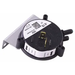 This YORK pressure switch is a replacement HVACR control used to monitor and regulate refrigerant or air pressure in commercial heating, ventilation, air conditioning, and refrigeration systems. It opens or closes electrical contacts at preset pressure thresholds to protect equipment and ensure safe operation.