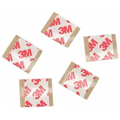 Double-sided tape with acrylic adhesive on a polyester film backing, supplied as 3/4-inch pre-cut squares. 8.3 mil thickness. Used for bonding, mounting, and splicing in precision assembly and general manufacturing.