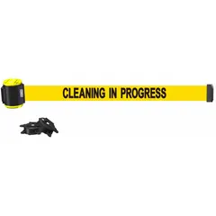 This magnetic-mount retractable belt barrier features a 15 ft yellow belt with maintenance and cleaning messaging. The black housing and base allow attachment to metal surfaces for temporary area separation in industrial or commercial settings.