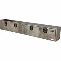 This topside truck box features double drop-down doors with a T-handle compression lid and keyed lock, finished in silver. Designed for secure storage of tools and equipment on pickup truck beds, it provides organized access while protecting contents from weather and theft