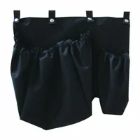 This black organizer attaches to a housekeeping truck to provide structured storage for cleaning supplies and tools. Overall dimensions: 18 in wide, 11 in tall, 6 in deep. Suitable for use in commercial facilities such as hotels, hospitals, and office buildings
