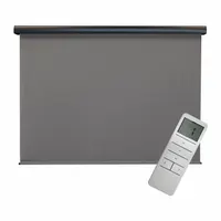 Motorized outdoor shade with gray fabric and oil-rubbed bronze valance. Features 90% UV protection and a cable tie-down system for stability. Operates via remote control. Suitable for patios, decks, and similar outdoor areas