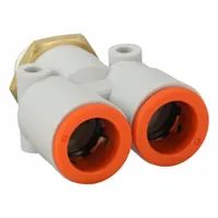 This SMC wye fitting is made of polybutylene and brass in a white finish. It has a pipe size of 1/2 in and is used for branching pneumatic or fluid lines in industrial systems, enabling efficient routing of compressed air or other media