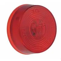 Round red incandescent clearance light with bracket/grommet mount and PL-10 connector. SAE PC lens code. Used on trucks, trailers, and heavy equipment to mark vehicle width and height