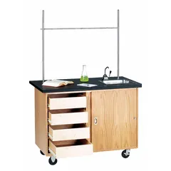 Fixed-height lab table with a laminate countertop in beige and oak wood finish. Overall height 36 inches, length 4 feet. Equipped with swivel casters for mobility. Suitable for laboratory, educational, and industrial work environments requiring a stable work surface.
