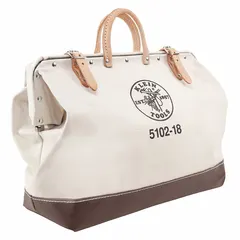 Brown canvas wide-mouth tool bag with one exterior pocket and one inside pocket. Measures 18 inches wide, 6 inches deep, and 14 inches high. Designed for carrying and organizing hand tools, test instruments, and small parts on job sites.