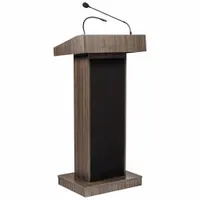 This laminate sound lectern in Ribbonwood finish includes an integrated amplifier and a mounted gooseneck microphone for clear audio delivery. It features a document rail for holding notes or scripts. Suitable for use in conference rooms, auditoriums, and houses of worship for public speaking and presentations