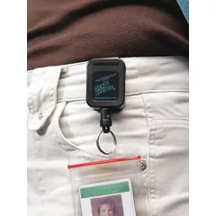 Nylon retractable key reel with 42-inch extended length and 1 1/8-inch key ring diameter. Designed for secure key management in industrial, maintenance, and facility settings where quick access and loss prevention are required.
