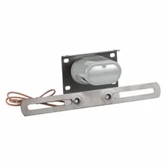 Incandescent license plate light with clear oval lens and 1-inch overall diameter. Features permanent bracket mount and pigtail electrical connection. Complies with FMVSS 108 standards. Suitable for illuminating license plates on trailers, trucks, and heavy equipment.