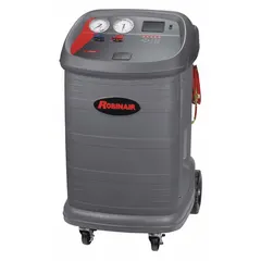 This machine recovers, recycles, and recharges R-12 and R-134a refrigerants from diesel vehicle AC systems. It meets SAE J2788 standards and features a graphical color display. Requires an external tank.