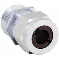 Straight metallic cable grip with steel body and silver finish, 1 in MNPT box connection, accepts cord diameters from 0.50 in to 0.63 in. Features IP66 ingress protection and Class I, Division 2 hazardous location rating. Includes brown color-coded grommet. Overall length 2 1/8 in. Used for securing and sealing cord or conduit at a threaded box entry in industrial environments