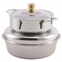 This 6 qt soup station from SPRING USA is constructed of stainless steel with a gold finish. It features a lift-off lid and measures 13 3/4 in overall diameter and 11 7/8 in overall width. NSF certified, it is suited for buffet or catering applications to keep soup, stew, or chili hot