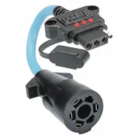This adapter converts a 7-way blade vehicle connector to a 4-way flat trailer plug. It is made of plastic and has an overall length of 2 7/8 inches and a height of 7 inches. Used in towing applications to connect trailers with 4-way flat wiring systems