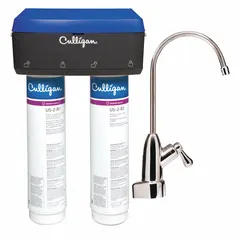 Point-of-use water filtration system designed for under-sink installation in residential or light commercial plumbing. Reduces atrazine. Features a 0.5 micron rating and 500-gallon service life. White finish.
