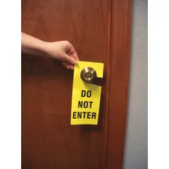 Yellow #11-size single-part tag with 'Do Not Enter' legend printed identically on both sides. Sold in packs of 10. Fastener not included. Suitable for hanging on door knobs to indicate restricted areas.