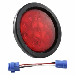 Red LED stop light with round shape, 4 5/16 in diameter and height. Features permanent grommet mount and pigtail electrical connection. Used for vehicle signaling on trailers and heavy equipment.