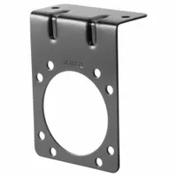 Mounting bracket for securing automotive electrical plugs in trailer wiring connections. Overall length 2 3/4 inches, height 3 3/4 inches. Used in fleet and vehicle maintenance for stable mounting of trailer connectors