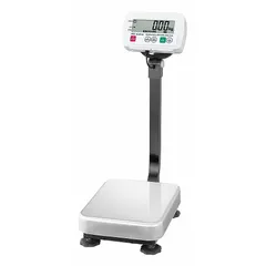 The SE-150KAM is a food scale with an LCD display, readability of 0.05 lb/0.02 kg, and a weighing surface of 11 3/4 in width. It features an IP68 rating for dust and water ingress protection and a USB connection port for data transfer. Suitable for commercial kitchen and food processing applications requiring washdown cleaning.