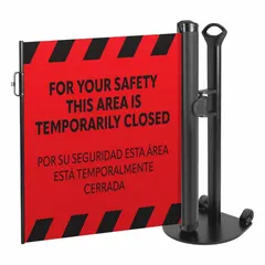 This retractable belt barrier system includes one mobile stand with a 38-inch post height and an 11 1/2-foot red belt printed with the message 'Area Temporarily Closed'. The belt features a round flat profile and a push-through latch, with black accents. It is used for temporary crowd control and area delineation in industrial, warehouse, and public settings.