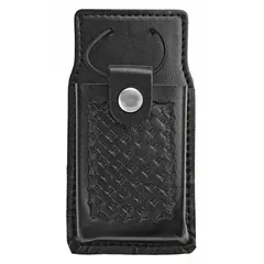 This duty equipment pouch is constructed of black leather with a basket weave pattern. It measures 6 1/2 inches by 2 1/2 inches and closes with a snap. Designed to carry a radio or phone on a belt or duty rig.