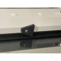 Rubber gravity sash stop for fume hoods. Prevents sash from closing fully to maintain airflow. Includes mounting hardware. Overall dimensions: 1 3/4 in width and length. Compatible with model GRF-350-48G7-2.