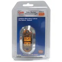 LED clearance light with amber lens, oval surface-mount design, and screw mounting. Features blunt cut wires for electrical connection. SAE P3 rated for side marker and clearance applications on trucks, trailers, and heavy equipment