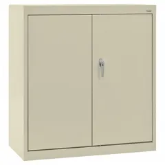 Stationary welded steel cabinet with powder-coated tan finish. Includes two adjustable shelves and a swing handle with keyed lock. Suitable for storage of tools, parts, and supplies in industrial and commercial settings.
