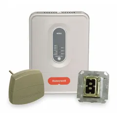 3-zone zoning control panel for HVAC systems operating at 24V AC. Supports 2 Cool/2 Heat configurations and requires a 2 Cool thermostat type. Includes a DATS C7735A1000 Discharge Air Temperature Sensor. Gray housing with terminal designation Rc.
