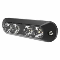 Green rectangular perimeter warning light with black bezel, operating on 12-24V DC. Features 30 selectable flash patterns and blunt cut wire connection. Bolt mount type. Overall height 1 3/8 in, width 5/8 in. Used on vehicles to signal caution or operational status in work zones