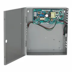 Steel-enclosed power supply board accepting 120/240V AC input. Provides regulated power for access control systems, electric strikes, and magnetic locks in commercial and industrial door hardware applications.