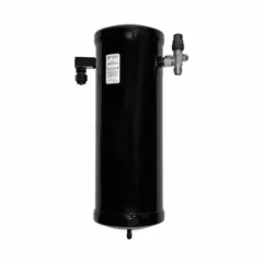 Suction line accumulator with steel shell and copper sweat connections. Includes metering orifice for controlled refrigerant and oil return. Used in refrigeration and air conditioning systems to protect compressors from liquid slugging.