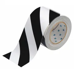 Striped black/white polyester tape for marking aisles, hazards, and work zones. 4 in wide, 100 ft long, 8 mil thick. No legend. Suitable for general purpose floor marking in industrial facilities.