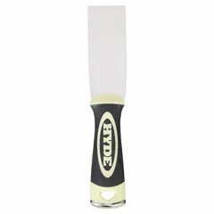 Standard spreading tool with a full straight carbon steel blade for applying and smoothing putty, filler, and adhesive. Polypropylene/TPE handle provides a comfortable grip. Suitable for general construction and maintenance tasks.
