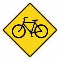 This 18 x 18 in aluminum sign features a diamond shape conforming to MUTCD W11-1 for bicycle crossing warnings. Constructed from 0.080 in thick aluminum with Diamond retroreflective grade, it is suitable for roadways and pathways to alert drivers of cyclist crossings