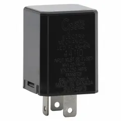 This GROTE flasher relay is a single-terminal device rated for 11-15V DC and 20 A, with a flash rate of 60 to 120 per minute. It is used to control the flash rate of turn signals or hazard lights in automotive and heavy-duty vehicle electrical systems.