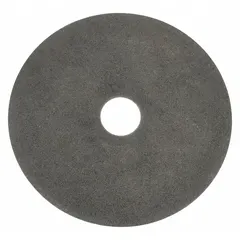 This NORTON Type 1 nonreinforced cut-off wheel measures 7 inches in diameter, 1/32 inch thick, with a 1-1/4 inch arbor hole. It is specified as 23A601-PB25 with a wheel hardness of P. Designed for precision cutoff, slotting, and grooving operations on ferrous metals in toolroom and maintenance shop environments.