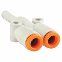 This SMC wye fitting is made of polybutylene terephthalate (PBT) and features three ports for 3/16 in OD tubing. It is a push-to-connect fitting used to split or combine pneumatic tubing in applications such as industrial automation, packaging, and material handling systems