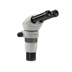 Binocular stereo microscope with 0.8X to 8X zoom range and 24 mm optical field of view. Features an 8 in x 6 in base plate and 78 mm working distance. Suitable for inspection, assembly, and quality control tasks requiring three-dimensional observation of small components.